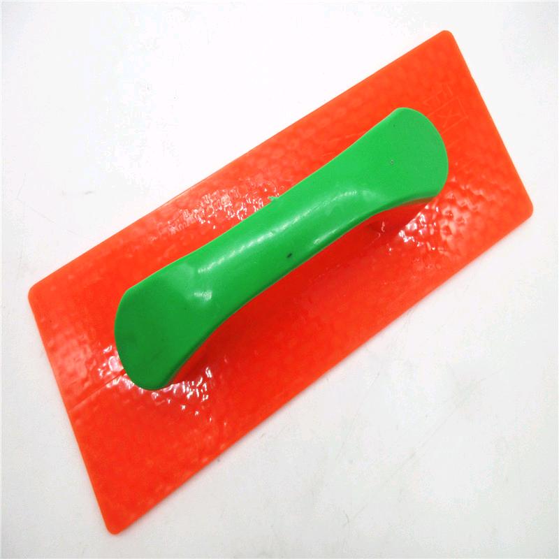 Plaster board, dark yellow plastic trowel, tempered plasterer board, sealant tool, plastic trowel
